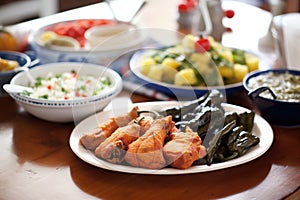 platter of chiles rellenos at a family dinner table