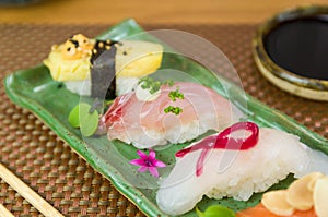 Platter with different types of nigirizushi, nigiri with different fish