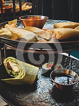 Platter of food along with dips.