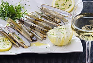 Platter with grilled ensis arcuatus. photo