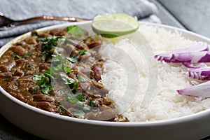 A platter of Indian red Kidney beans curry or Rajma Masala and rice