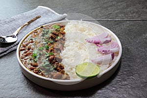 A platter of Indian red Kidney beans curry or Rajma Masala and rice