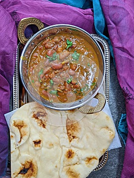 A platter of Indian red Kidney beans curry or Rajma Masala and rice