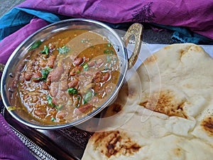 A platter of Indian red Kidney beans curry or Rajma Masala and rice