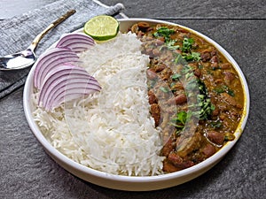 A platter of Indian red Kidney beans curry or Rajma Masala and rice