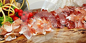 Platter of Italian cold cuts, coppa, salami and raw ham