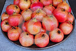 Platter pomegranate fruit for sale at a farmers market