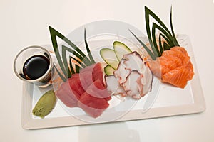Platter of sashimi sushi with tuna and salmon