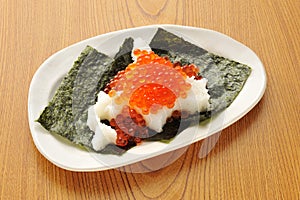 Platter of seaweed with salmon roe and plain rice in traditional