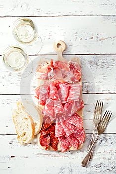 Platter of serrano jamon Cured Meat and ciabatta