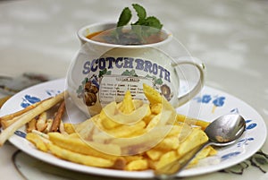 Platter of snacks chips,waffer & cup 0f tomato soup