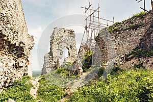 Plavecky castle in Slovak republic, ruins with scaffolding