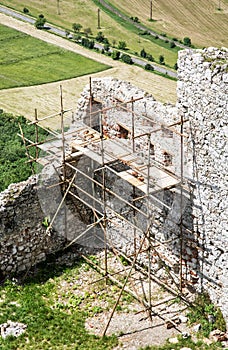 Plavecky castle in Slovakia, ruins with scaffolding, travel dest