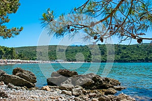 Plavi Horizonti beach landscape. Radovici. Tivat bay. Montenegro. Sandy clearest water beach excellent for kids