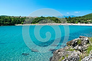 Plavi Horizonti beach landscape. Radovici. Tivat bay. Montenegro. Sandy clearest water beach excellent for kids photo