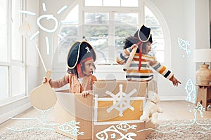 Play, box ship or pirate children point at fantasy fish, role play, or pretend in cardboard container. Boat trip, fun