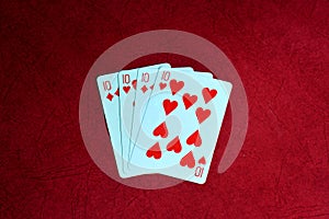 Play cards on red background.
