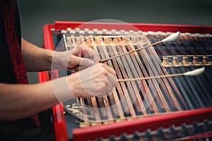 Play the cimbalom photo