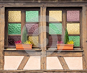 Play of colours - window of a Fachwerkhaus