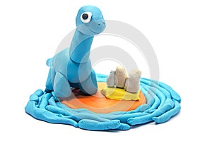 Play dough Brachiosaurus on white background.