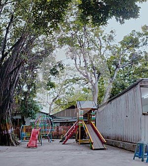 A play ground with tree with some object