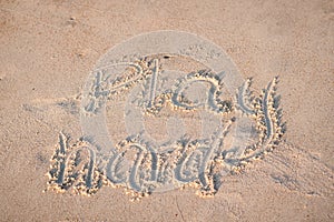 `Play Hard` Written in the Sand
