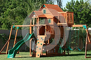 Play house swings and slide photo