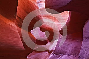 The play of light in a red-orange Antelope Canyon