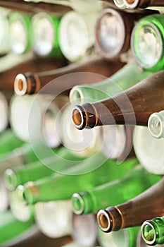Play of light, reflection and transparency on a wall of bottles