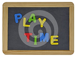 Play time in colored letters on slate