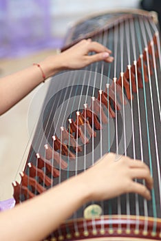 Play traditional Chinese music instrument