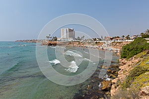 Playa Cala Cerrada Orihuela Spain beautiful beach near La Zenia in summer sunshine photo