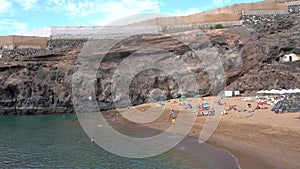 Playa de Abama with tourists on Tenerife with calm water