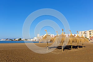 Playa de la Isla Puerto de Mazarron Murcia Spain with parasols and sunshades