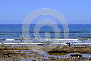 Playa De Las Americas beach surfers