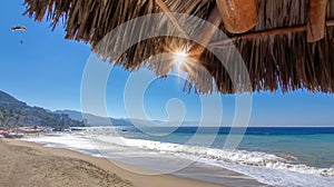 Playa De Los Muertos beach and pier close to famous Puerto Vallarta Malecon, the city largest public beach