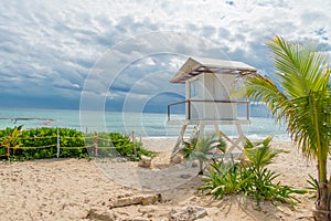 Playa del Carmen, Mexico - January 10, 2018: Outdoor view of safeguard hut in the beach during a sunny day with some