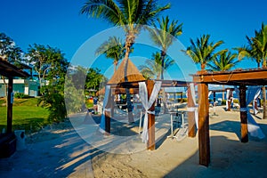 PLAYA DEL CARMEN, MEXICO - NOVEMBER 09, 2017: Outdoor view of beautiful huts located along the beach in PLaya del Carmen