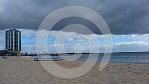 playa Reducto e grand hotel con nuvole scure photo
