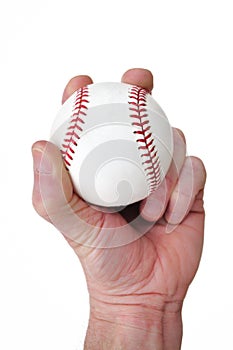 Player Gripping a New Baseball photo