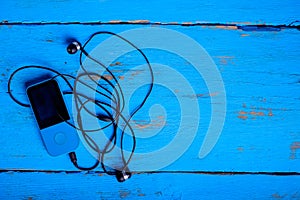 Player headphones on a blue background