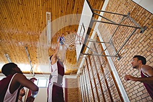 Player scoring a goal while playing basketball