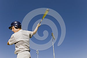 Player Swinging Baseball Bat