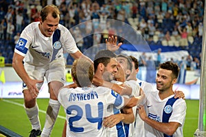 Players of FC Dnipro congratulate footballplayer after scoring