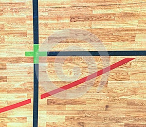 Playfield lines painted on renewal gymnasium wooden floor