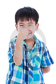 Playful asian boy covering his nose. Isolated on white background.