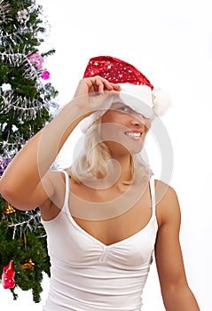 playful blonde near christmas tree