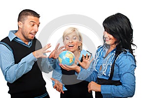 Playful business people with globe