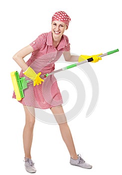 Playful charwoman with mop on white photo
