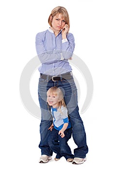 Playful child disturb mother to talk on cell